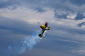 Third AirFestival at Chaika airfield. The plane is rapidly fly in high and leaving behind it a long plume of smoke