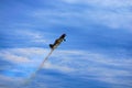 Third AirFestival at Chaika airfield. The plane is rapidly takes off in high and leaving behind it a long plume of smoke