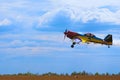 Third AirFestival at Chaika airfield. A small sports plane flies at a low altitude