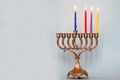 Third day of Hanukkah with burning Hanukkah colorful candles in Menorah.Chanukkah-jewish holiday. Royalty Free Stock Photo