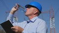 Thirsty Engineer Electrician Work and Drink Fresh Water Royalty Free Stock Photo