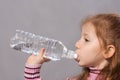 Thirsty girl drinking clean Royalty Free Stock Photo