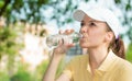 Thirsty woman drinking fresh water