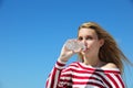 Thirsty woman drinking water