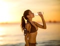 Thirsty woman drinking water