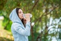 Thirsty woman drinking water after sport activities.Health concept. Royalty Free Stock Photo