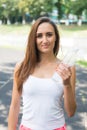 Thirsty woman holds water bottle. Thirst and water balance concept. Signs you definitely need pay attention your body Royalty Free Stock Photo