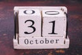 Thirty-first of October on calendar of wood