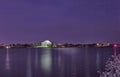 Thomas Jefferson Memorial illuminated at night with the tidal basin in the foreground during the peak cherry blossom festival Royalty Free Stock Photo