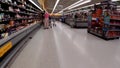 Walmart retail superstore interior people shopping face masks on