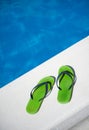 Thongs by the pool Royalty Free Stock Photo