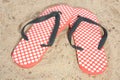 Thongs in the sand Royalty Free Stock Photo