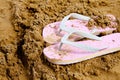 .thongs in the sand Royalty Free Stock Photo