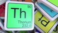 Thorium Th block on the pile of periodic table of the chemical elements blocks. 3D rendering