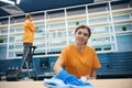 Thorough cleaning of all surfaces in kitchen area in coworking space Royalty Free Stock Photo