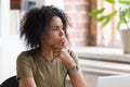 Thoughtful African American businesswoman or student feeling uncertain