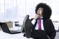 Thoughtful Afro manager in the office