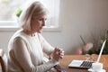 Thoughtful aged female considering something making decision Royalty Free Stock Photo