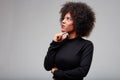 Thoughtful attractive young Black woman looking up to the side Royalty Free Stock Photo