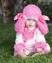 Thoughtful Baby Dressed In Poodle Costume