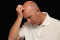 Thoughtful bald man Royalty Free Stock Photo