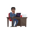 Thoughtful black man working at laptop