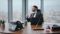 Thoughtful boss sitting office desk looking laptop screen close up. Man worried Royalty Free Stock Photo