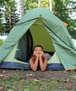 Thoughtful boy in camping tent Royalty Free Stock Photo