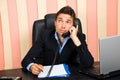 Thoughtful business man talking at phone Royalty Free Stock Photo