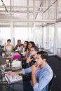 Thoughtful business team sitting at creative office Royalty Free Stock Photo