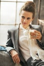 Thoughtful business woman drinking coffee Royalty Free Stock Photo