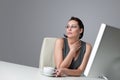 Thoughtful business woman at office with coffee Royalty Free Stock Photo