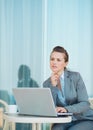 Thoughtful business woman working with laptop Royalty Free Stock Photo