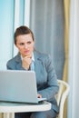 Thoughtful business woman working with laptop Royalty Free Stock Photo