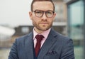 Thoughtful businessman staring at the camera Royalty Free Stock Photo