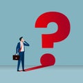 Thoughtful businessman thinking. Businessman and his big question mark shadow Royalty Free Stock Photo