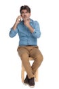 Thoughtful casual man talking on his phone Royalty Free Stock Photo