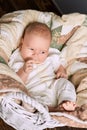 Thoughtful caucasian infant. Royalty Free Stock Photo