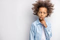 Thoughtful child isolated over white background Royalty Free Stock Photo