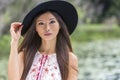 Thoughtful Chinese Asian Young Woman Girl Wearing Black Hat Royalty Free Stock Photo