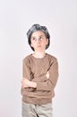 Thoughtful cute young boy looking up Royalty Free Stock Photo