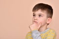 Thoughtful cute young boy Royalty Free Stock Photo