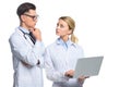 thoughtful doctors with laptop looking at each other Royalty Free Stock Photo