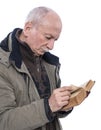 Elderly man reading holy bible Royalty Free Stock Photo