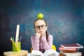 Thoughtful Elementary School Girl Apple on Head Royalty Free Stock Photo