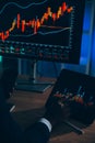 Thoughtful focused successful caucasian male stock investor, broker, financial adviser, sits at work desk, looks at computer, Royalty Free Stock Photo