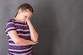 A thoughtful girl over her school problems and tasks Royalty Free Stock Photo