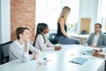 Thoughtful gorgeous girl is thinking about her boyfriend during the conference Royalty Free Stock Photo