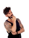 Thoughtful handsome man with tattoos Royalty Free Stock Photo