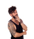 Thoughtful handsome man with tattoos Royalty Free Stock Photo